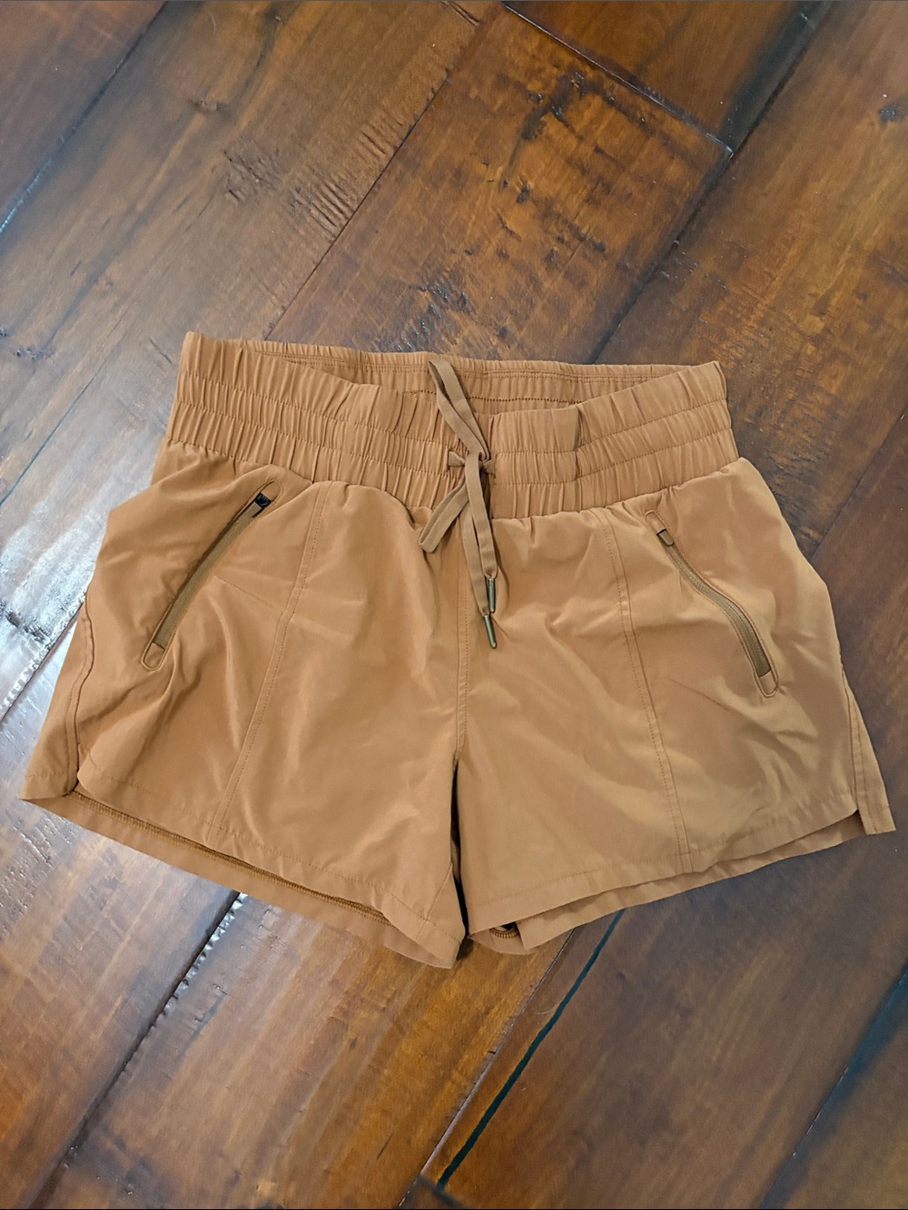 all in motion Women's Drawstring Performance Shorts in Tan
